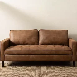 Kirklands Home Wyatt Faux Leather Sofa Brown