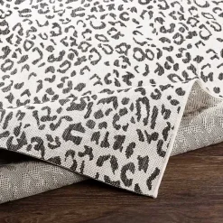 New Kirklands Home Cauli Leopard Print Outdoor Rug, 7x7 Black