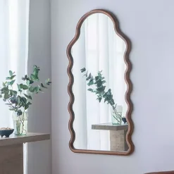 Kirklands Home Dark Gold Arched Wavy Wall Mirror
