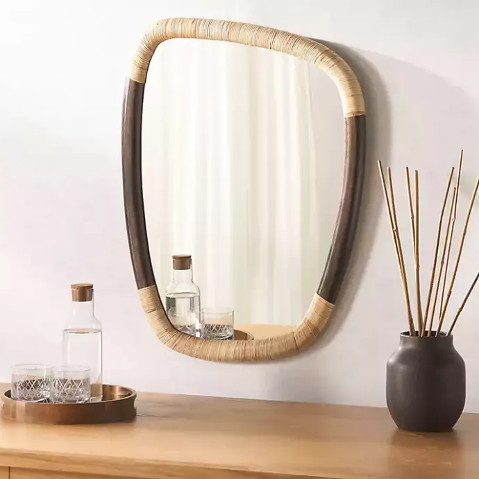 Kirklands Home Dark Wood and Natural Cane Abstract Wall Mirror