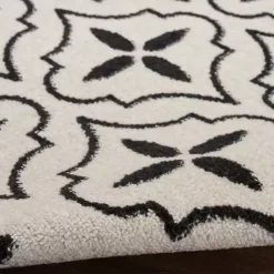 Kirklands Home Ivory & Black Quatrefoil Indoor/Outdoor Rug, 4x6